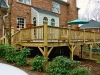 Treated wood deck provided extra entertaining space