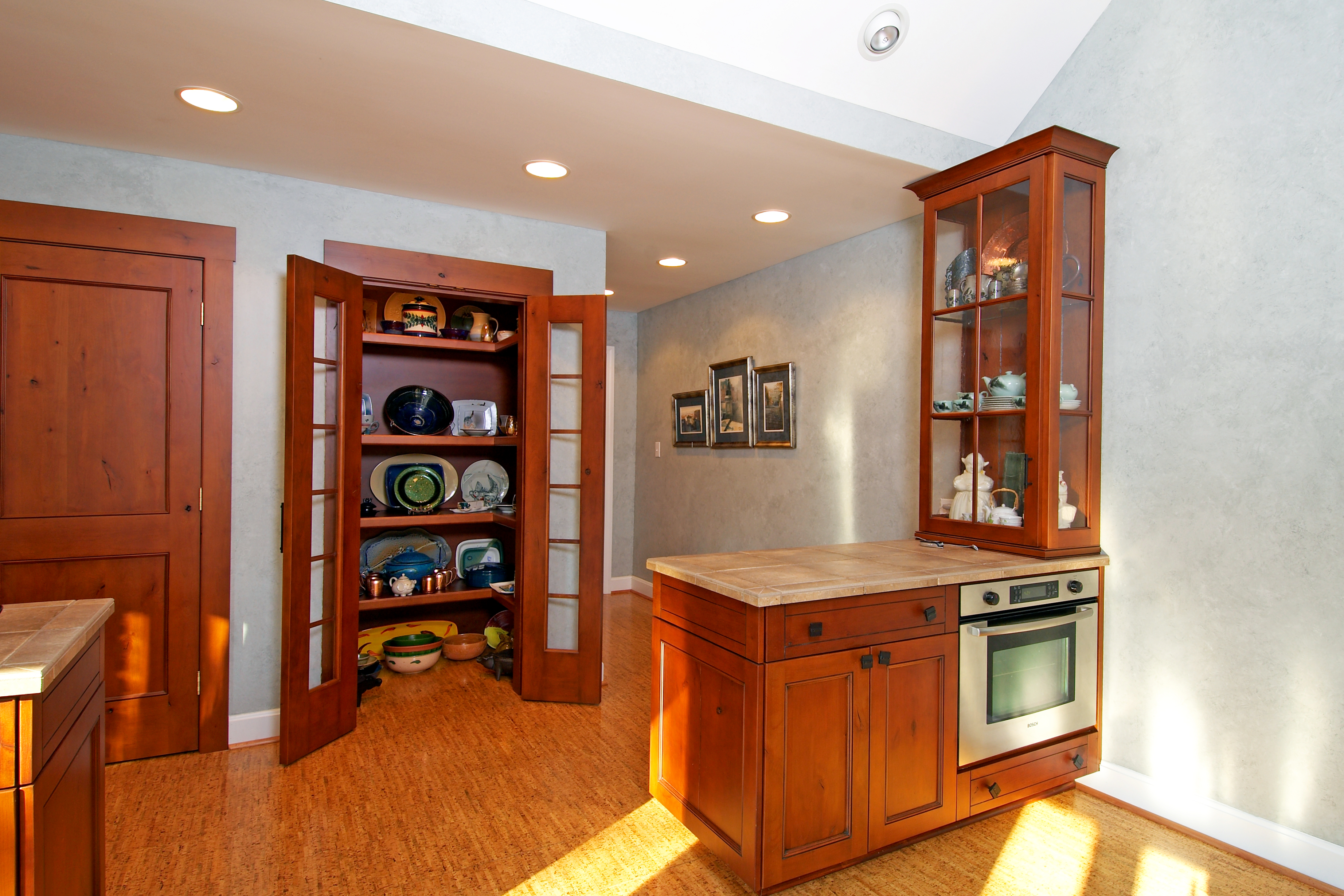 Custom cabinetry was made to allow for the homeowners collections